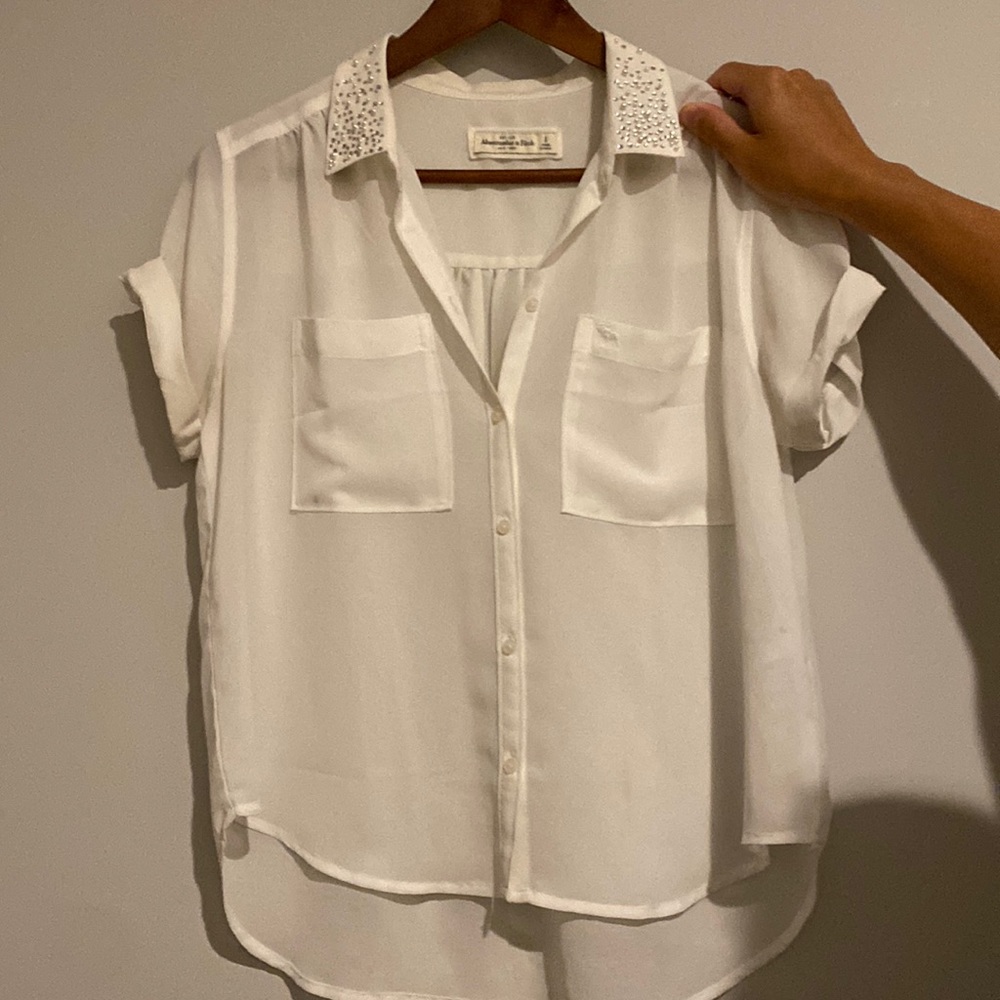 Abercrombie & Fitch short sleeved, two pocket white sheer blouse.